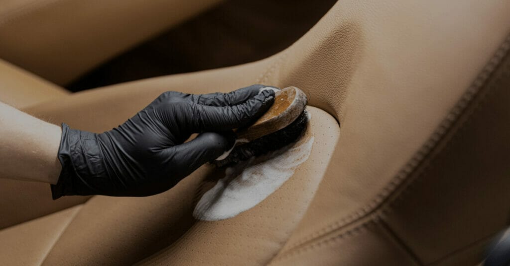 What causes leather car seats to crack